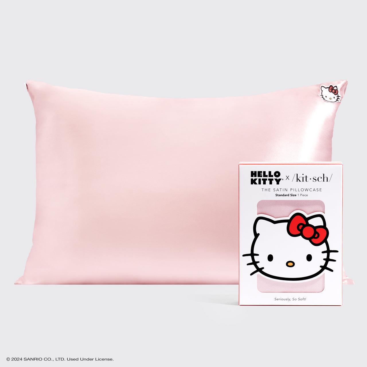 غطاء وسادة ساتان من Hello Kitty x Kitsch - وجه Hello Kitty باللون الوردي الصلب